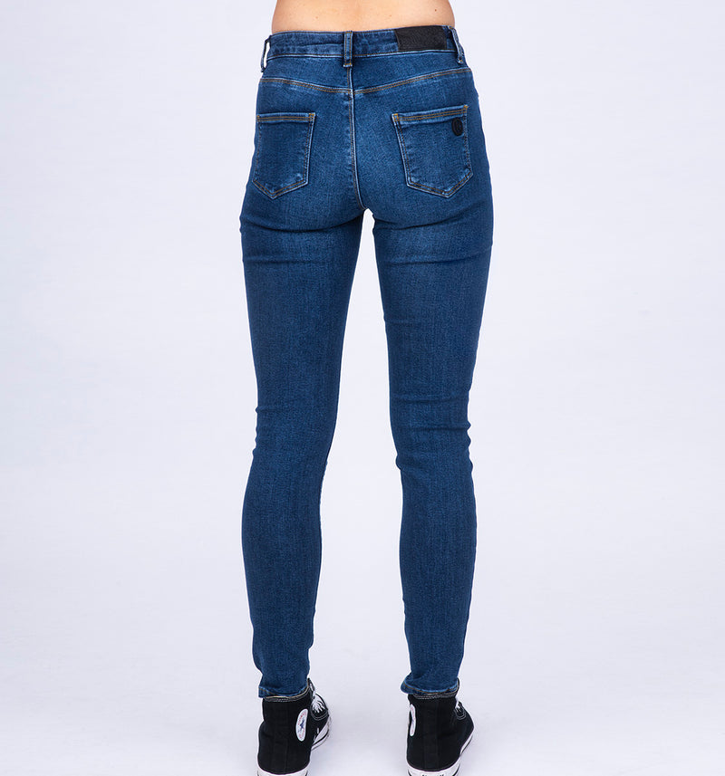 Skinny elastische Fit Mid Waist Jeans in mittlerem Denim Blau